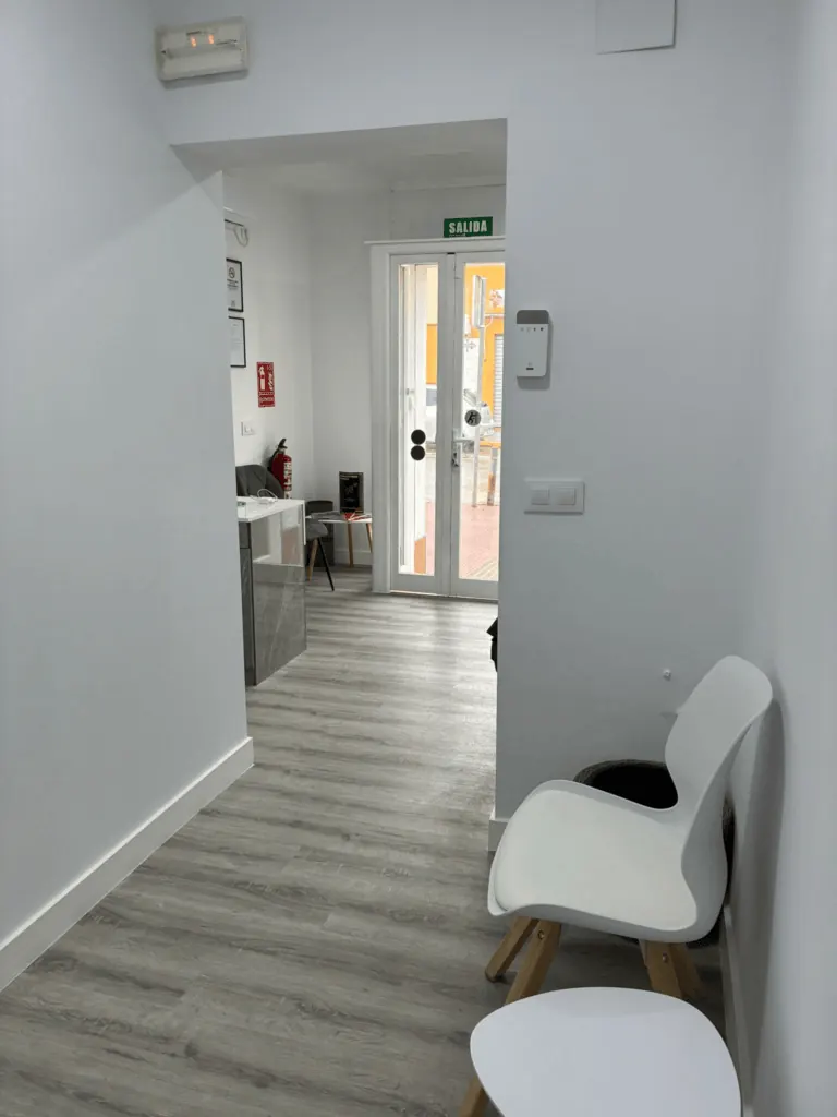 Bright interior corridor leading to the entrance